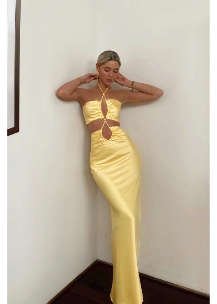 Jagger and Stone Ruby Maxi in Lemon, Size 6, 8 and 12. Featuring a unique design of intersecting straps on the torso area where the skirt and bust connect and again above the bust piece. Perfect for formals, races, birthdays etc. Front on full length view of dress