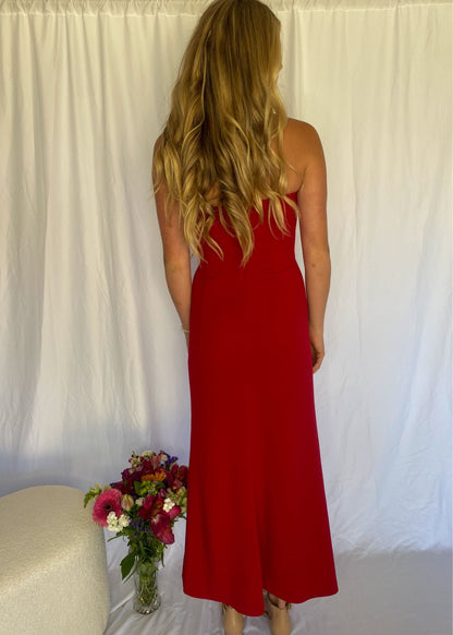 xRed strapless full length dress. Top bit of dress has boning like a corset an zip up back. Size XS best fitted to a 8 - small 10. Front on view of the back of the dress