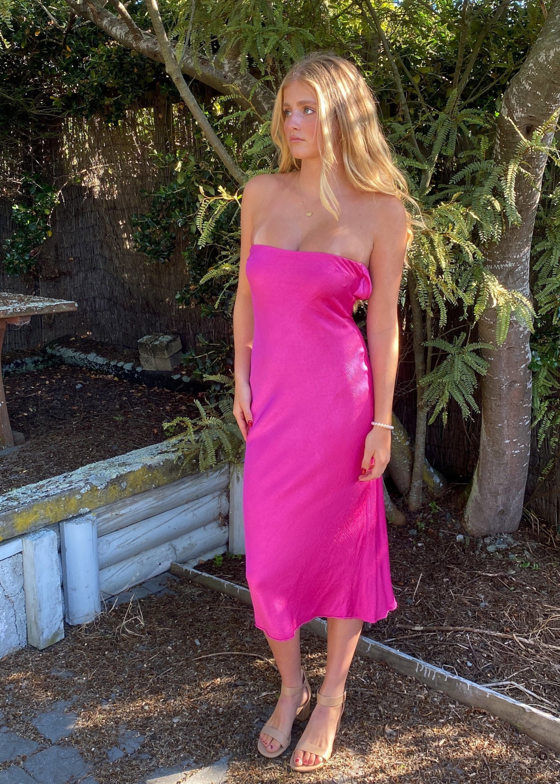 Bec and Bridge Moondance Midi Dress in Hot Pink, Size 6 and 10. Perfect for events like formals, 21sts, races etc. Silky/Satiny feel slight flow to dress. Front side full length view of dress. 