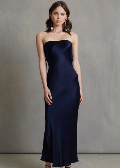 Bec and Bridge Moondance Midi Dress in Navy, Size 14. Perfect for events like formals, 21sts, races etc. Viscose Material with a Silky/Satiny feel slight flow to dress. Front full length view of dress. 
