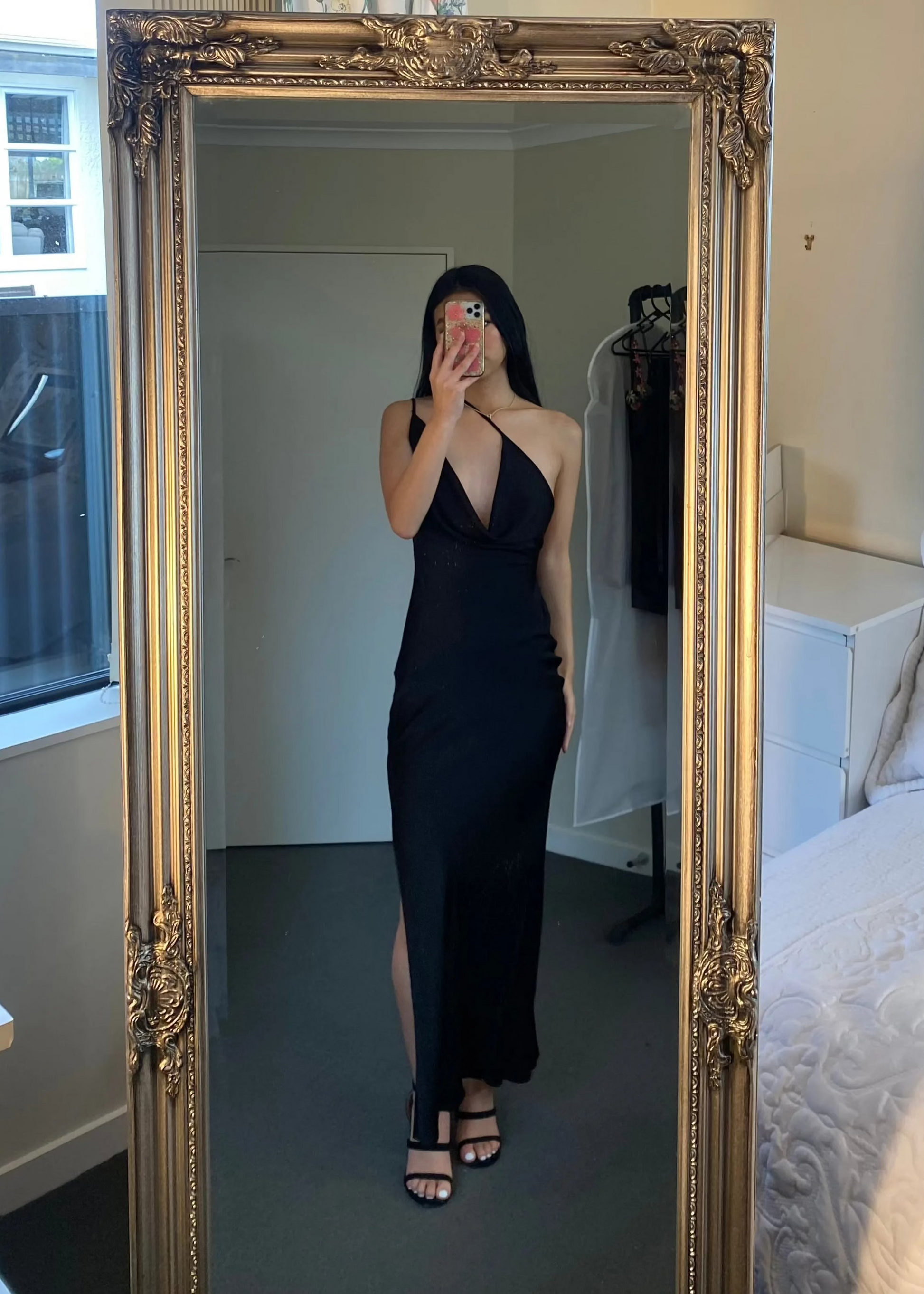 Johannah Cowl Midi in Black, Size 8. Featuring an asymmetrical design with a low cut bust area and low draping back with slight adjustability of strings tying at bottom of back area. Perfect for formal events