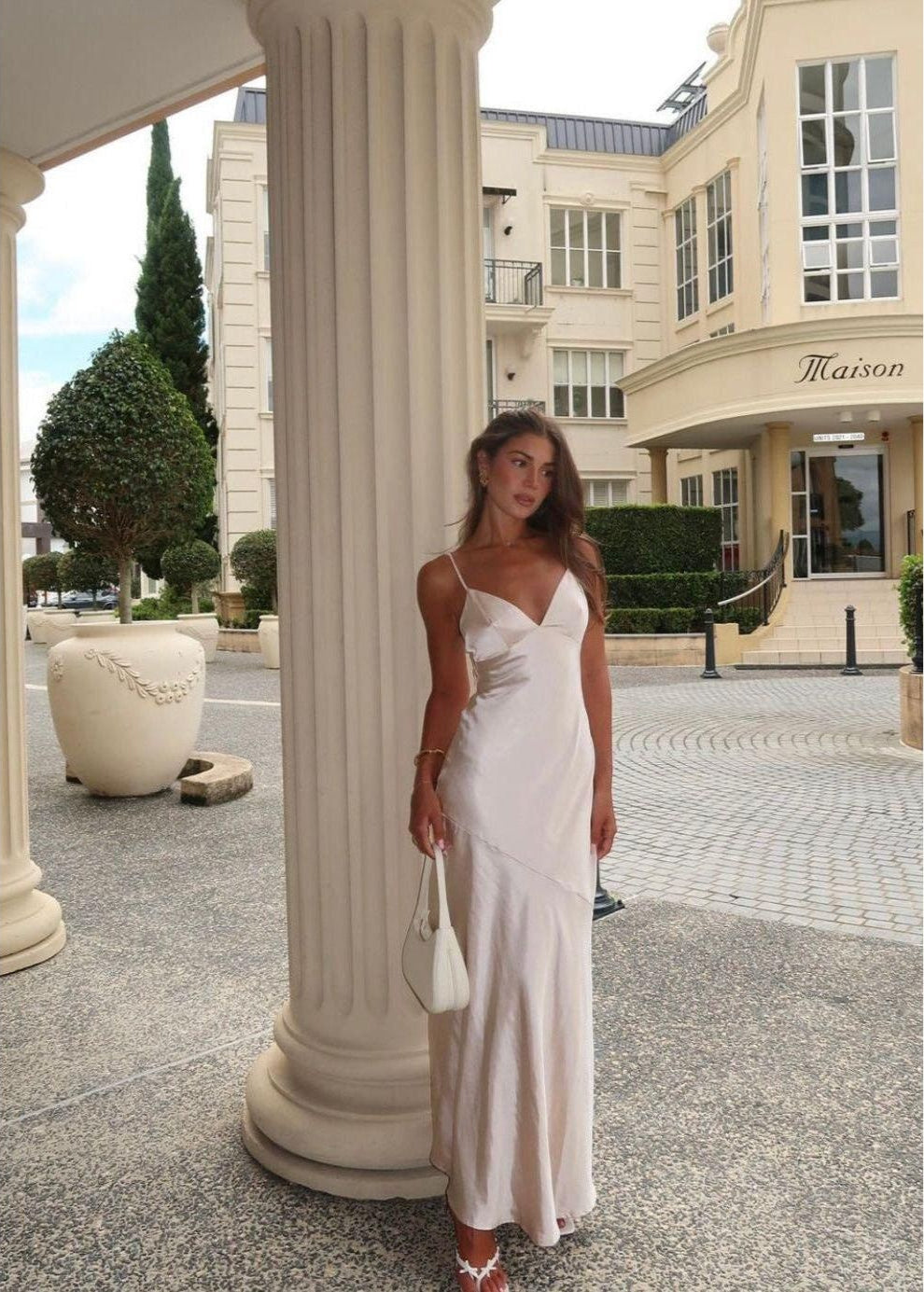 Billy J Boutique Helena Maxi Dress in Champagne, Size 8. Polyester material. Perfect for formal events. Zip up back. Front on full length view of dress.