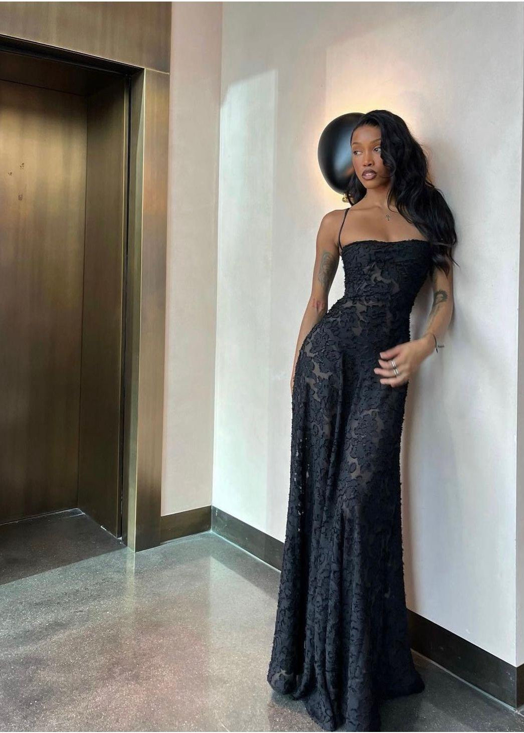 House of CB Seren Maxi Dress in Black, Size XS and L. Perfect for formal events. Lace up back and zip at bottom of lace up.. Semi sheer fabric with a doubled lined bust. Front on full length view of dress