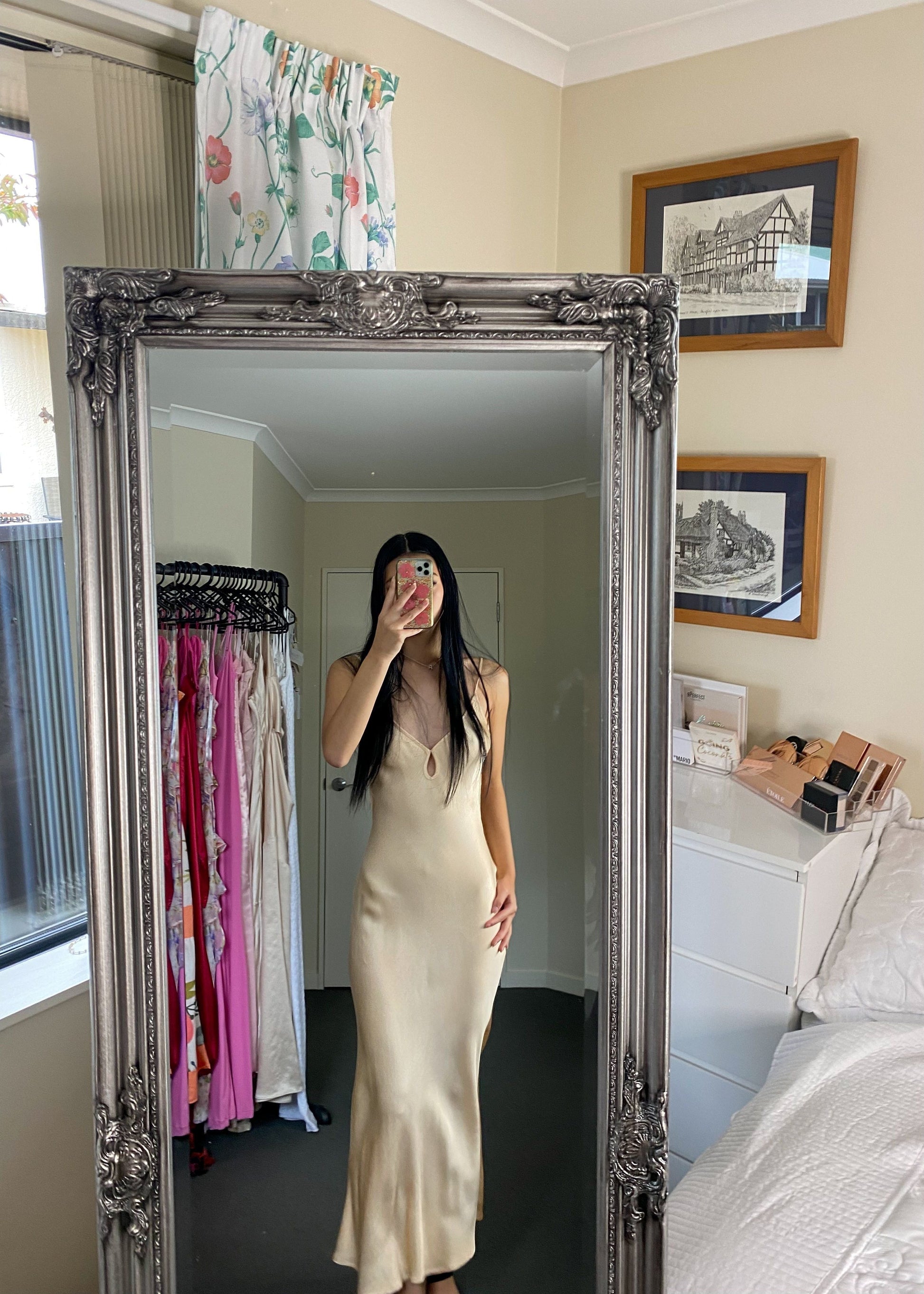 Bec and Bridge Cedar City in custom Peachy/Champagne Shade, Size 8. Open back with adjustable straps/back of bust area. Perfect for formal events. Made of viscose and ecovero. Front on full length view of dress.