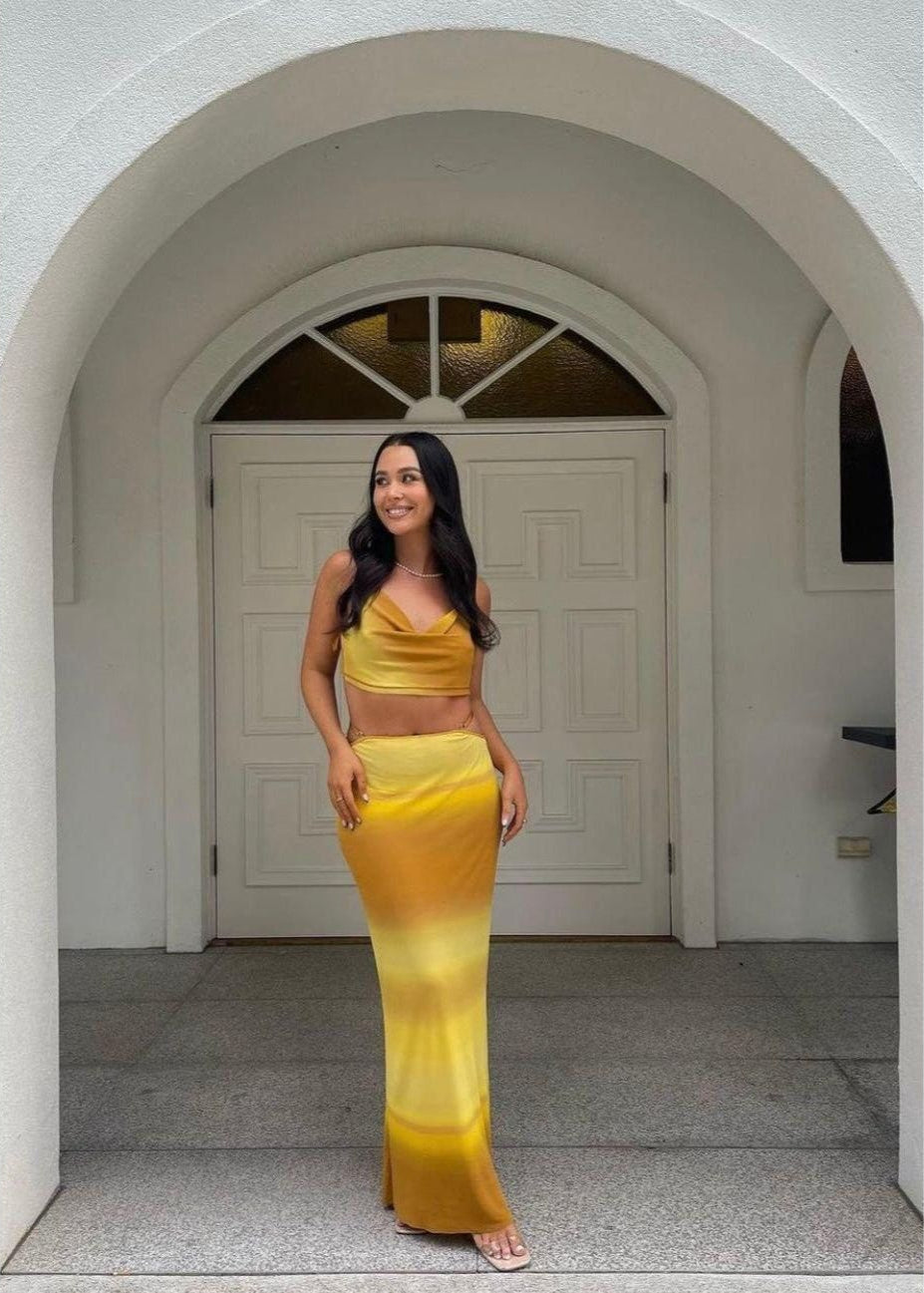 Bec and Bridge Amara Set in Ombre Yellow/Mustard, Size 6.  Adjustable top at back and skirt with zip. Perfect for summer events with a semi tight fit and breathable fabric. Front on full length view of set