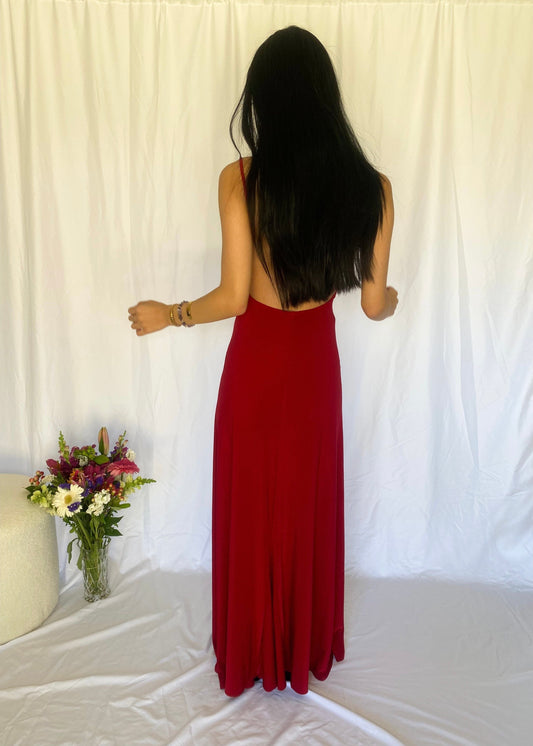Abbys by Abbey Elle Gown in Red, Size 6/XS. Open back with low cut front an two slits coming up each front side of the dress ending at mid thigh. Perfect for formal events. Back view of dress.