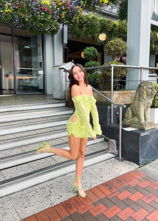 House of CB Babydoll Mini in Lime, Size S and L (Plus Cup). Perfect for the races, wineries, bottomless brunch etc. Zip up back and holes around the hip where the dress can be adjusted slightly length and with of hole wise. Front on side view of dress