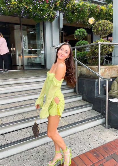 House of CB Babydoll Mini in Lime, Size S and L (Plus Cup). Perfect for the races, wineries, bottomless brunch etc. Zip up back and holes around the hip where the dress can be adjusted slightly length and with of hole wise. Front on side view of dress