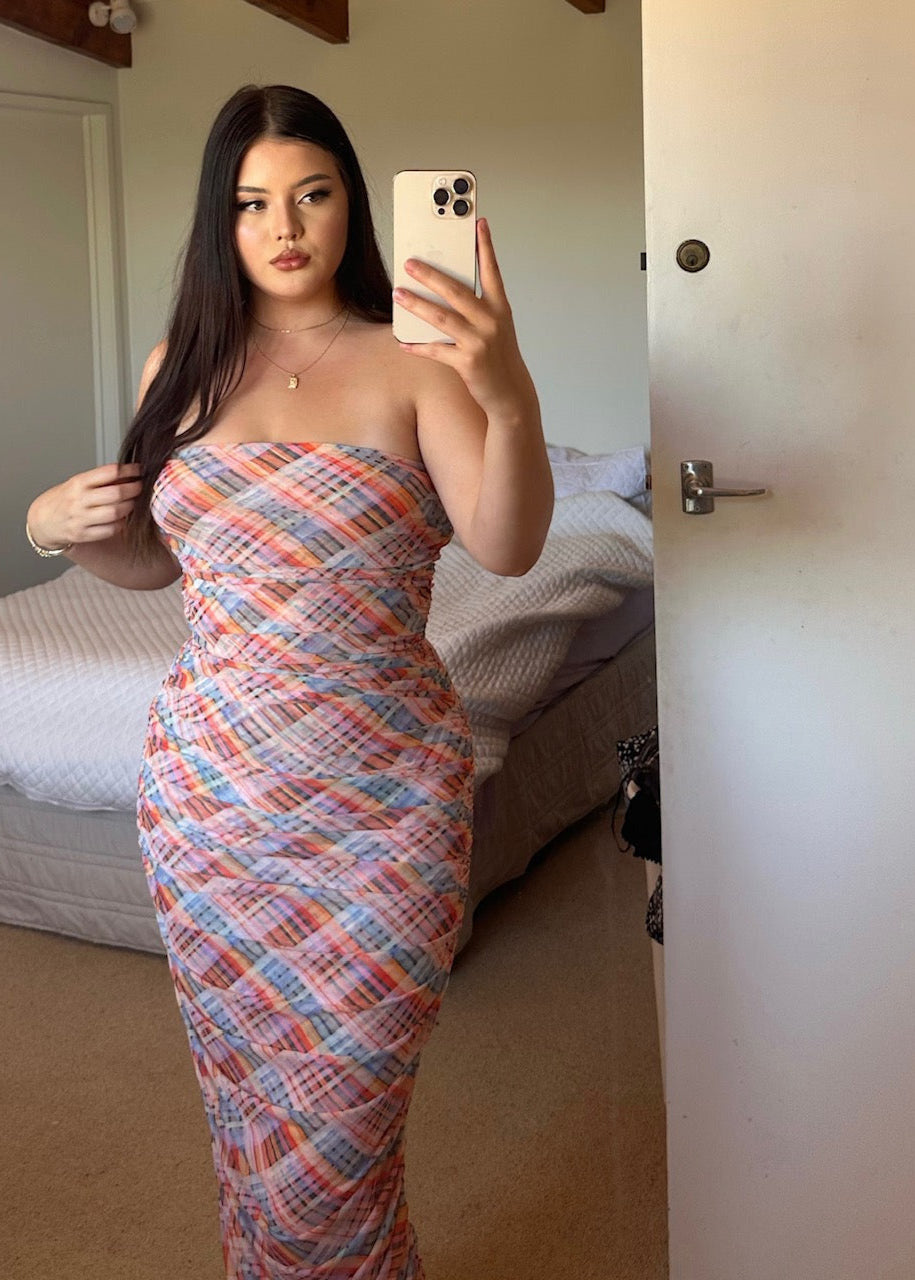 Ruby Cherry Mesh Strapless Tube Dress, Size 12. Candy tartan mesh print with gathered side seams that create ruching that gently accentuate the contours of your silhouette. Perfect for races, weddings, formals, wineries etc. Front on view of dress.