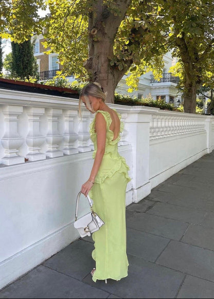 House of CB Pixie Maxi Dress in Green, Size S. Featuring straps with a v cut into the bust and some frill details on the dress. Perfect for formals, races, wineries, bottomless brunch etc. Zip up side. Side full length view of dress