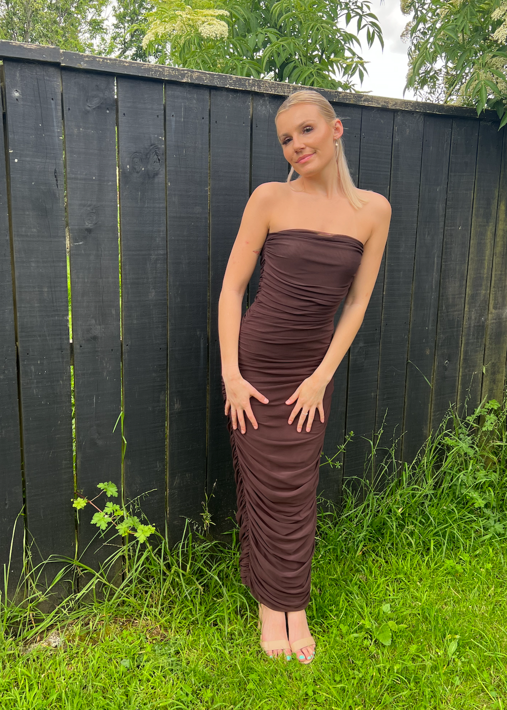 Ruby Ginni Mesh Tube in Chocolate Brown, Size 8. Featuring a strapless design with gathered side seams that create ruching that gently accentuate the contours of your silhouette. Perfect for formals, weddings, races, wineries, birthdays etc. Front on view of dress.